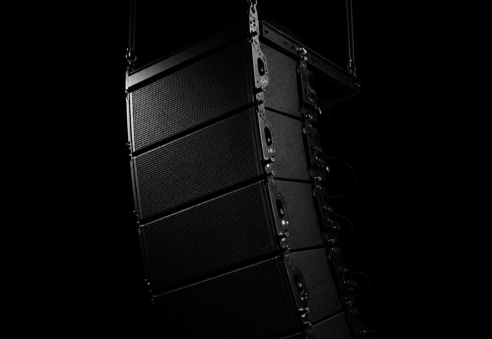 Sonara flagship line-array system suspended in darkness